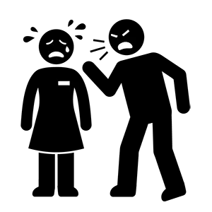 泣いている女性従業員に向かって激しく怒っている男性のシルエット