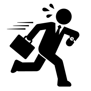 腕時計を見ながら焦って走っているスーツ姿の男性のシルエット